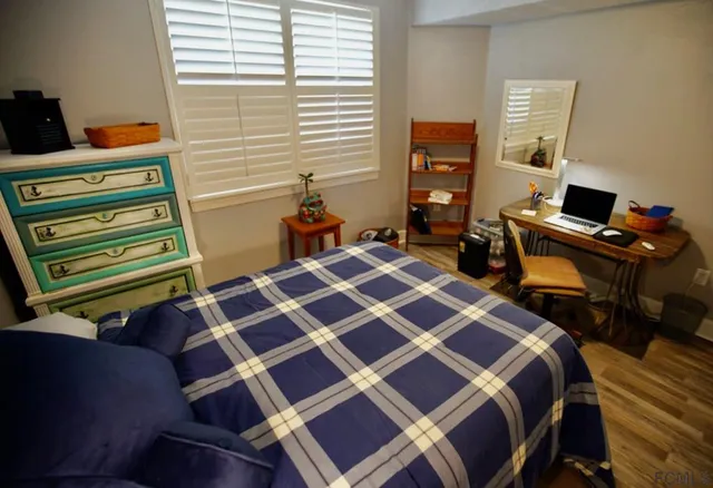 a view of a hallway with washer and dryer