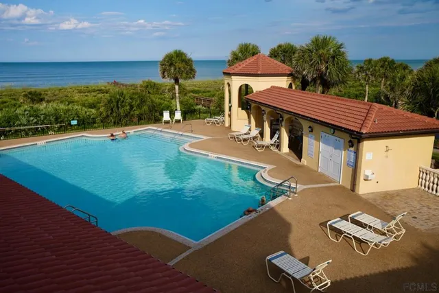 a view of a backyard with a patio