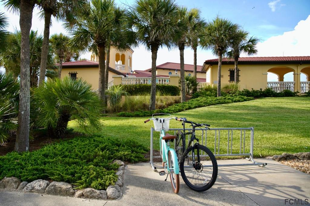 80 Surfview Drive, Unit 602 Palm Coast, FL 32137 - Photo 22 of 24 a view of a backyard with a patio