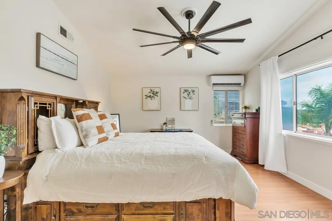 9410 Brian Way El Cajon, CA 92021 - Photo 14 of 49 a large white bed in a white room