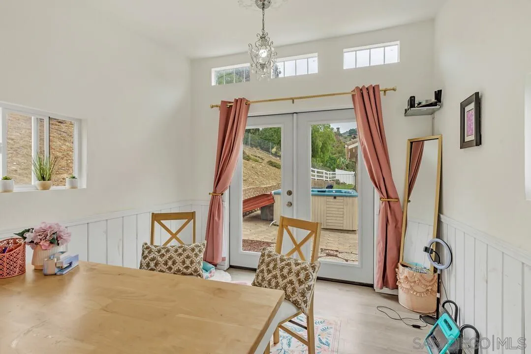 9410 Brian Way El Cajon, CA 92021 - Photo 17 of 49 a bedroom with furniture and a large window