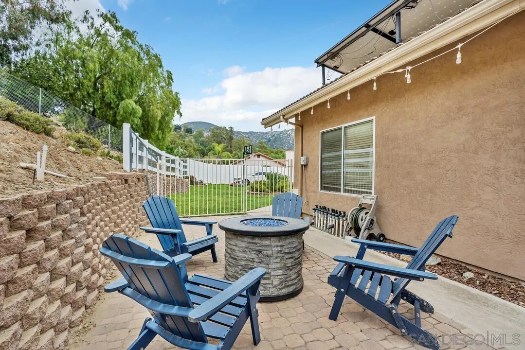 9410 Brian Way El Cajon, CA 92021 - Photo 20 of 49 a patio with table and chairs