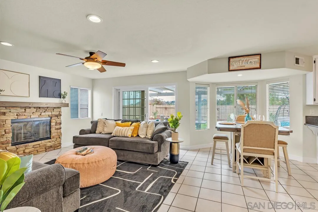 9410 Brian Way El Cajon, CA 92021 - Photo 23 of 49 a living room with furniture and a fireplace