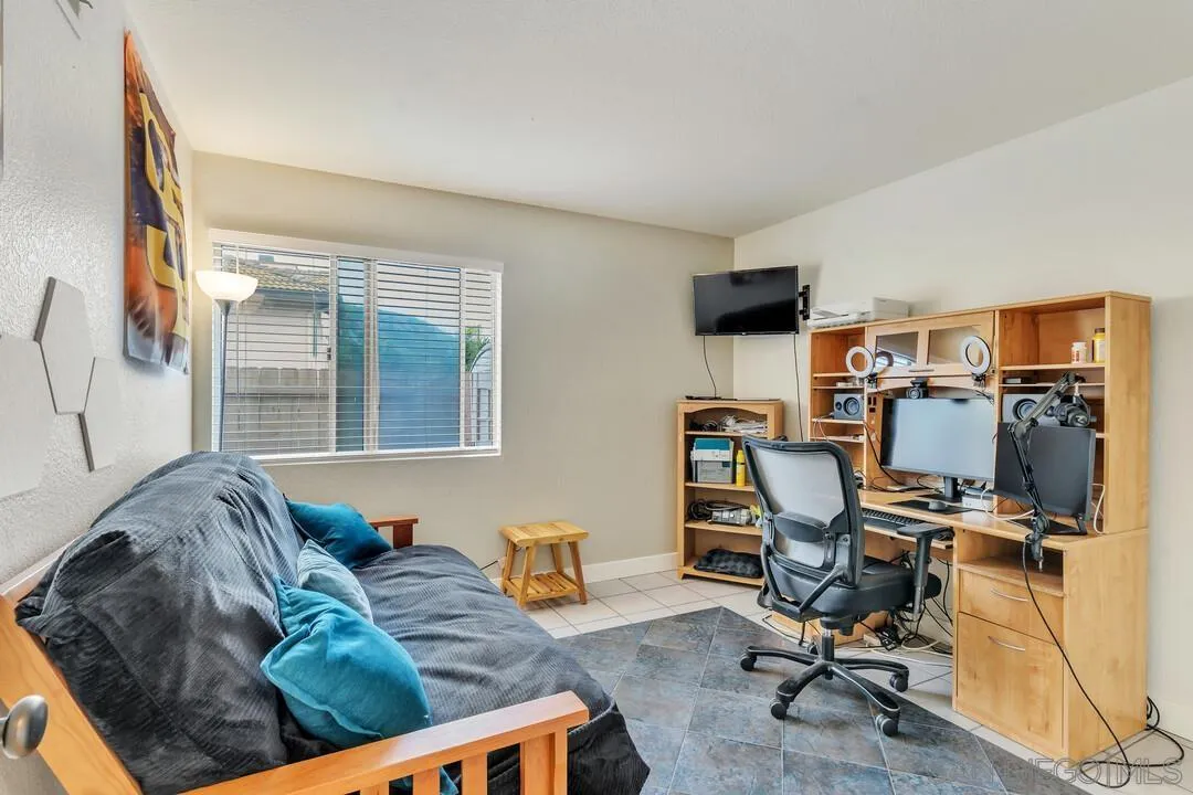9410 Brian Way El Cajon, CA 92021 - Photo 31 of 49 a workspace with furniture and a window