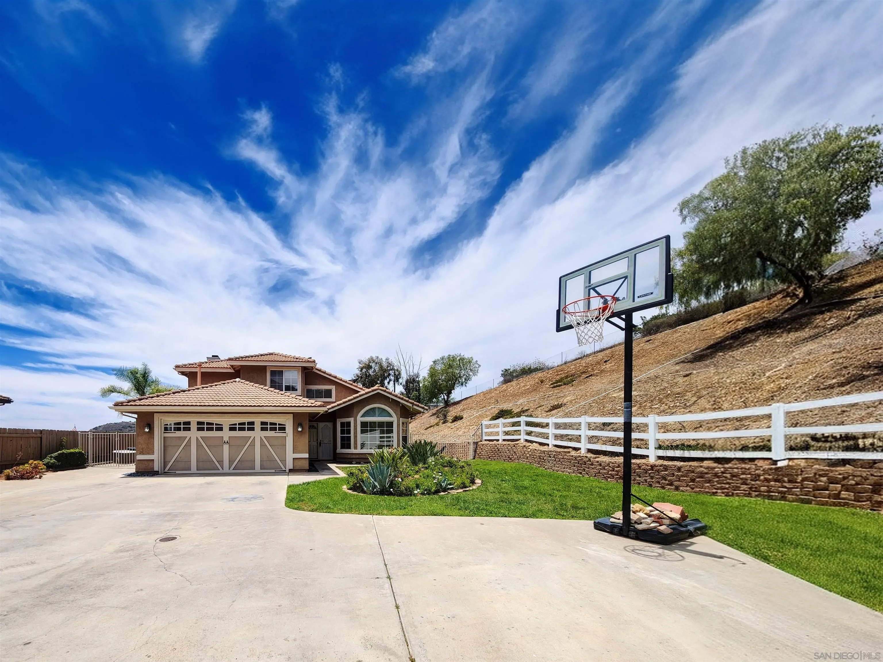 9410 Brian Way El Cajon, CA 92021 - Photo 44 of 49 a front view of a house with a yard