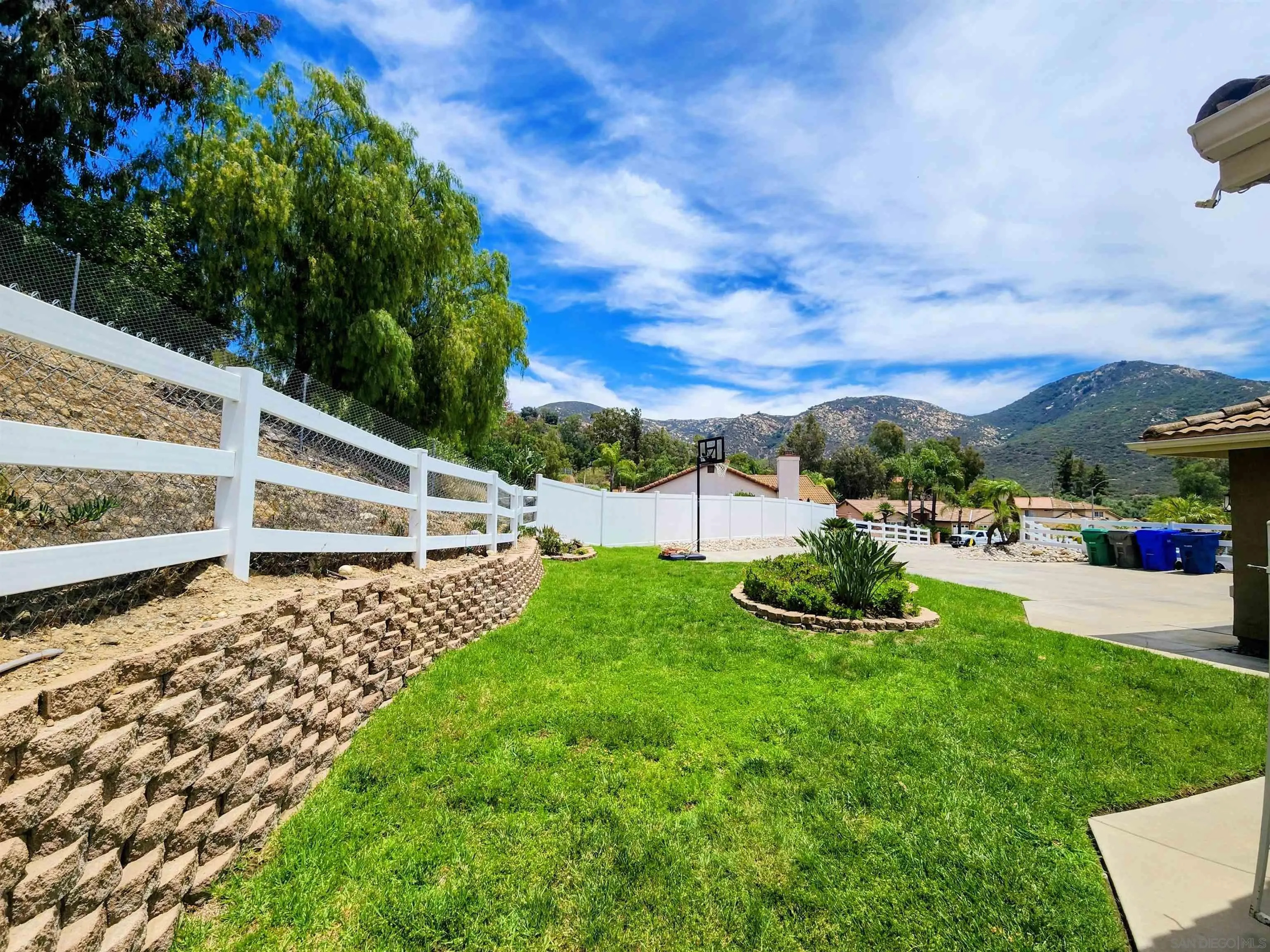 9410 Brian Way El Cajon, CA 92021 - Photo 45 of 49 a view of a garden with an outdoor seating