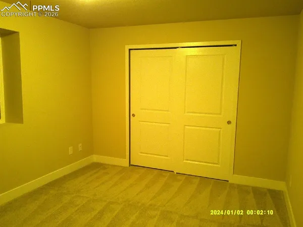 a view of a big room with wooden floor