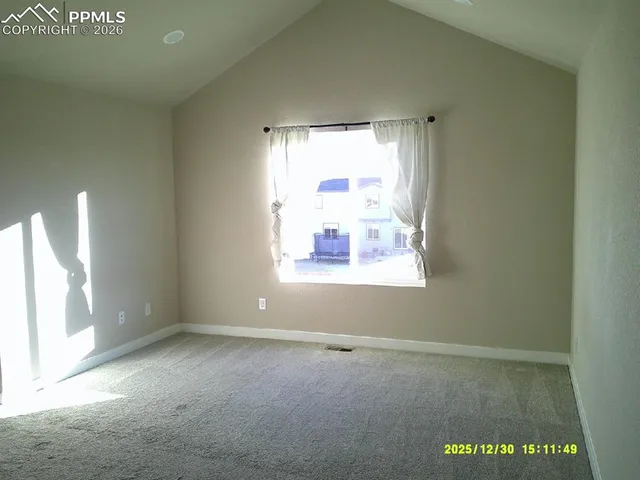 an empty room with a window