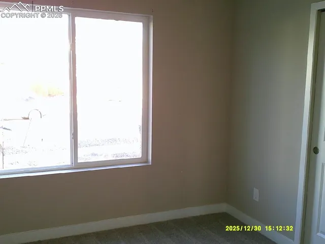 a view of a small space with a window