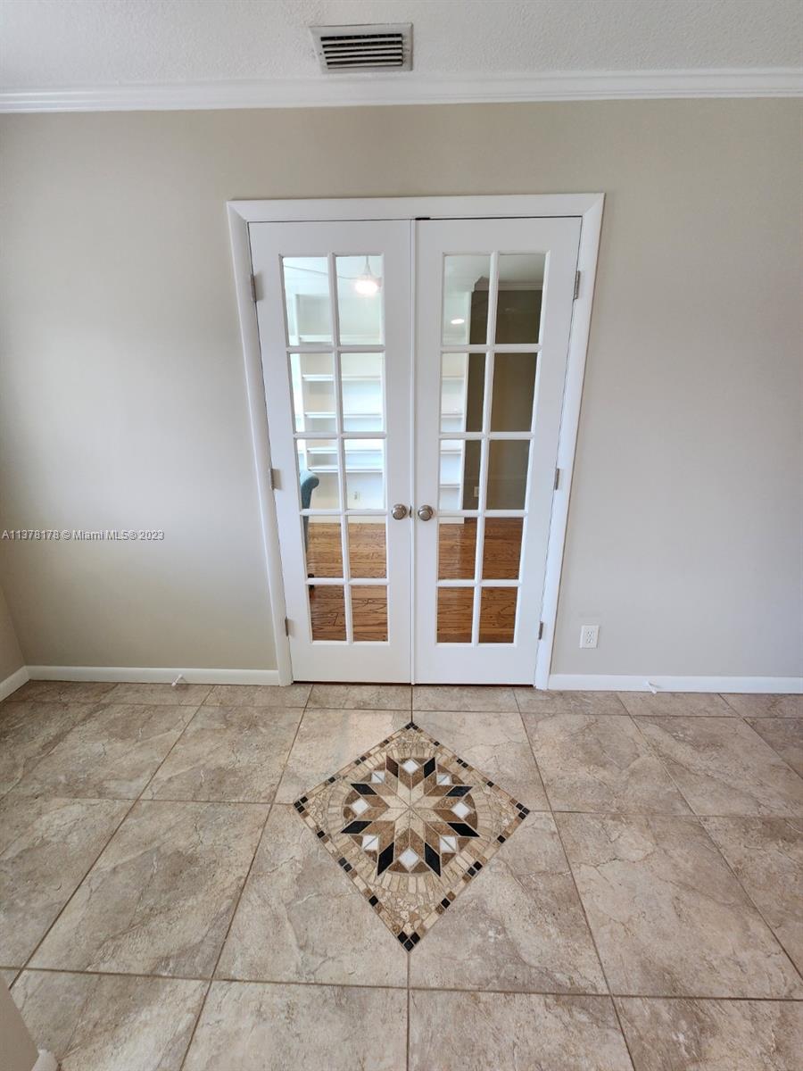 1513 Lance Road Jupiter, FL 33469 - Photo 18 of 33 a view of a window in a room