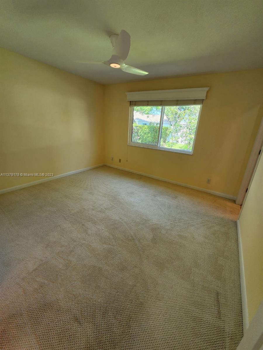 1513 Lance Road Jupiter, FL 33469 - Photo 25 of 33 an empty room with a window