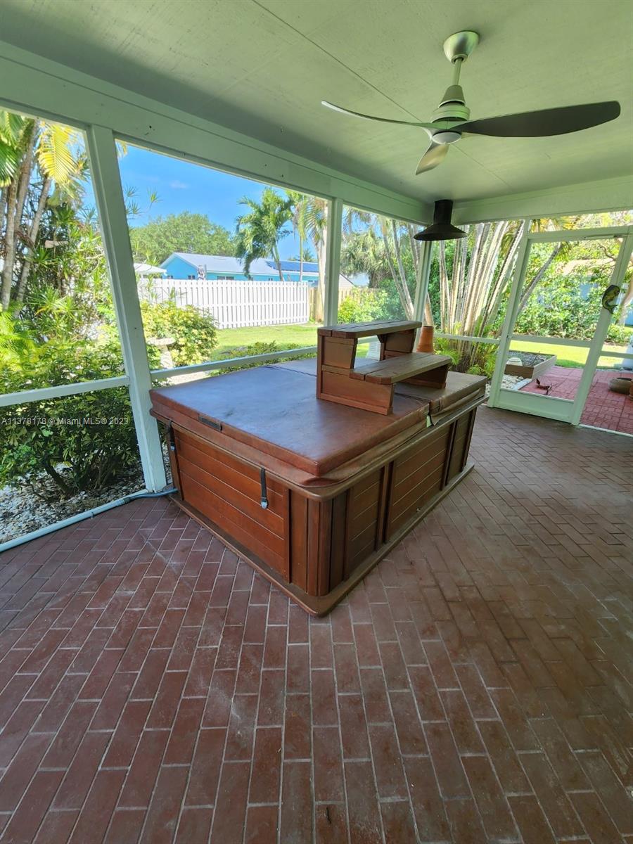 1513 Lance Road Jupiter, FL 33469 - Photo 29 of 33 a room with pool table and outdoor seating