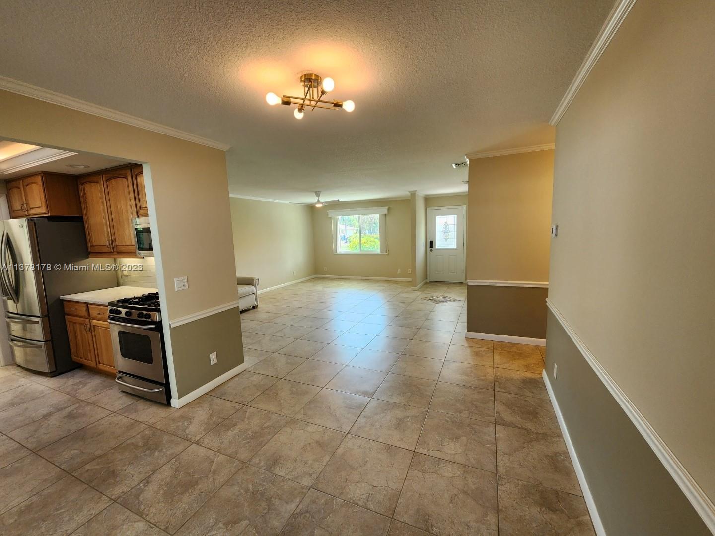 1513 Lance Road Jupiter, FL 33469 - Photo 6 of 33 a view of a kitchen with a sink