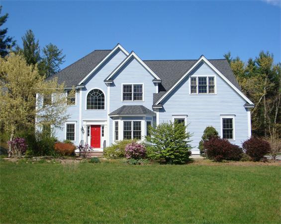 141 Stone School Road Sutton, MA 01590 - Photo 1 of 30 a front view of house with yard and green space