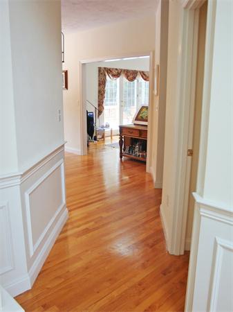 141 Stone School Road Sutton, MA 01590 - Photo 16 of 30 a living room with furniture and a wooden floor
