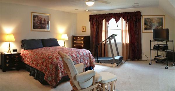 141 Stone School Road Sutton, MA 01590 - Photo 20 of 30 a bed room with a bed and a television