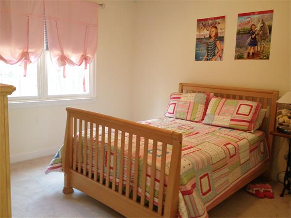 141 Stone School Road Sutton, MA 01590 - Photo 23 of 30 a bedroom with a bed and window
