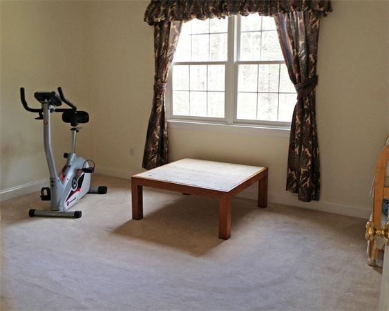 141 Stone School Road Sutton, MA 01590 - Photo 25 of 30 a view of a room with gym equipment