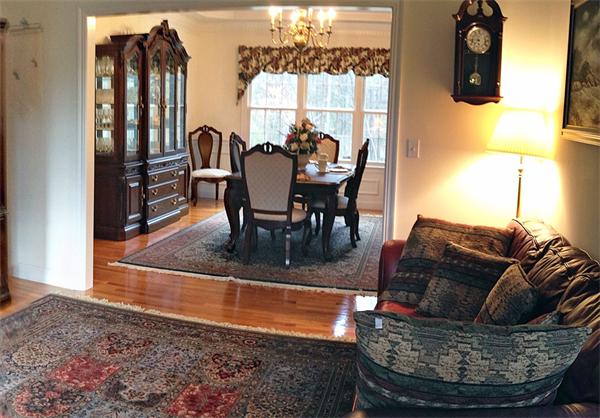 141 Stone School Road Sutton, MA 01590 - Photo 8 of 30 a view of a dining room with furniture and window