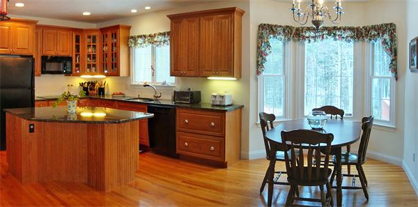 141 Stone School Road Sutton, MA 01590 - Photo 10 of 30 a kitchen with a table chairs stove and refrigerator