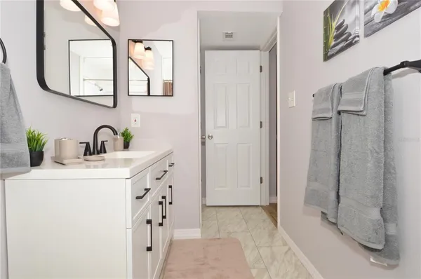 an aerial view of a house with yard swimming pool and outdoor seating