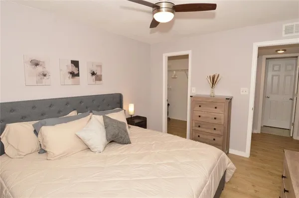 a view of a room with wooden floor and outdoor space