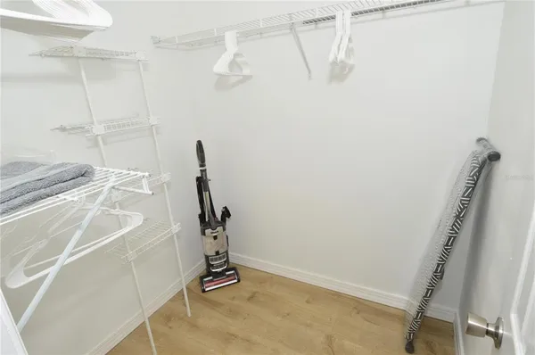 a front view of a house with swimming pool having outdoor seating