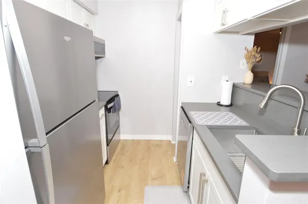 a living room with a couch and a table