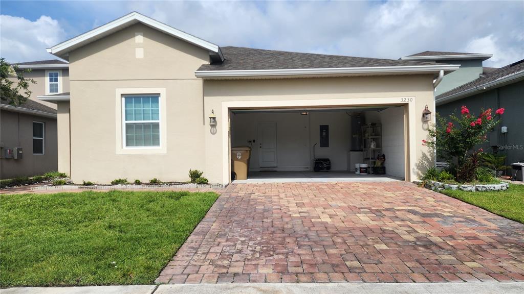 3230 Stratton Circle Kissimmee, FL 34744 - Photo 28 of 28 a view of a house with yard and porch