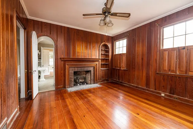 a view of entryway with wooden door