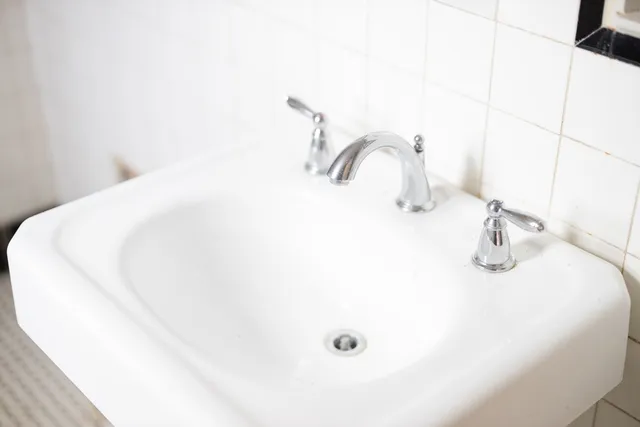 a brick wall with a mirror