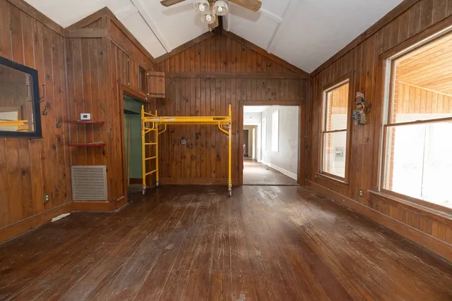 a view of a kitchen with furniture and a window