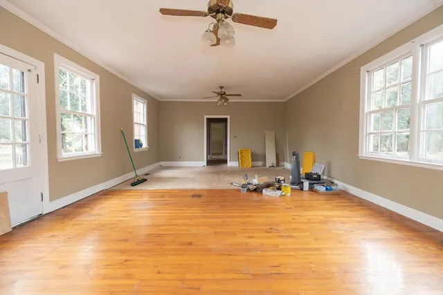 a view of an empty room with a window