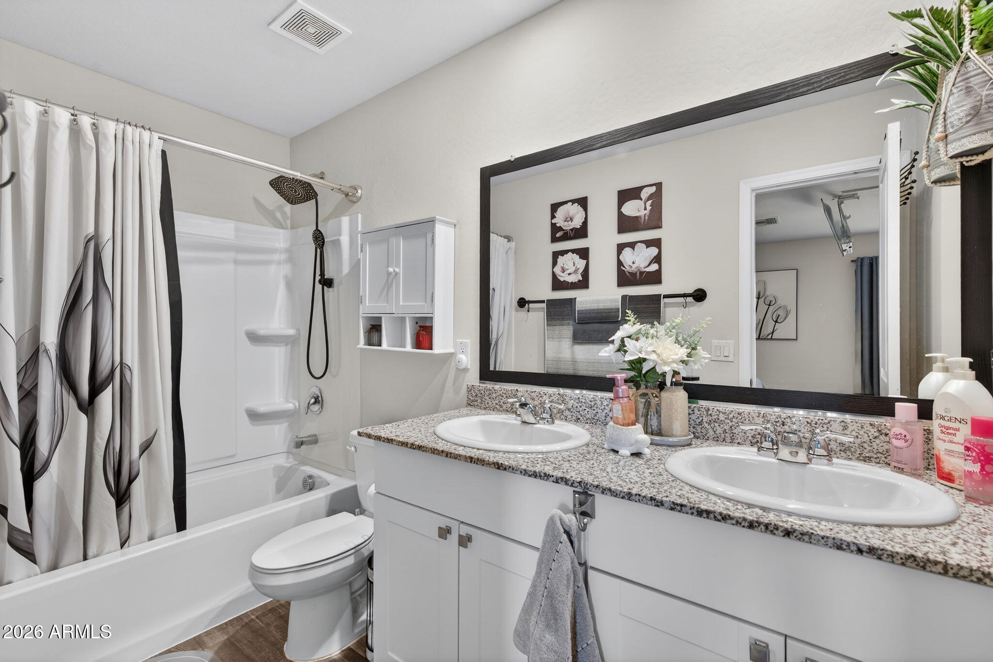 14423 South Capistrano Road Arizona City, AZ 85123 - Photo 20 of 36 a bathroom with a granite countertop sink toilet and shower