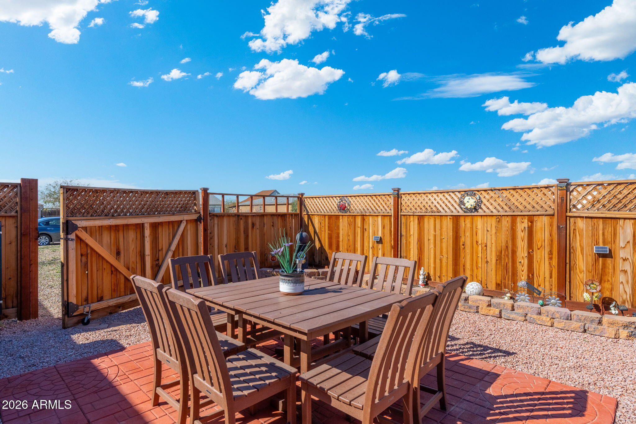 14423 South Capistrano Road Arizona City, AZ 85123 - Photo 33 of 36 a view of a dining room with furniture and wooden floor