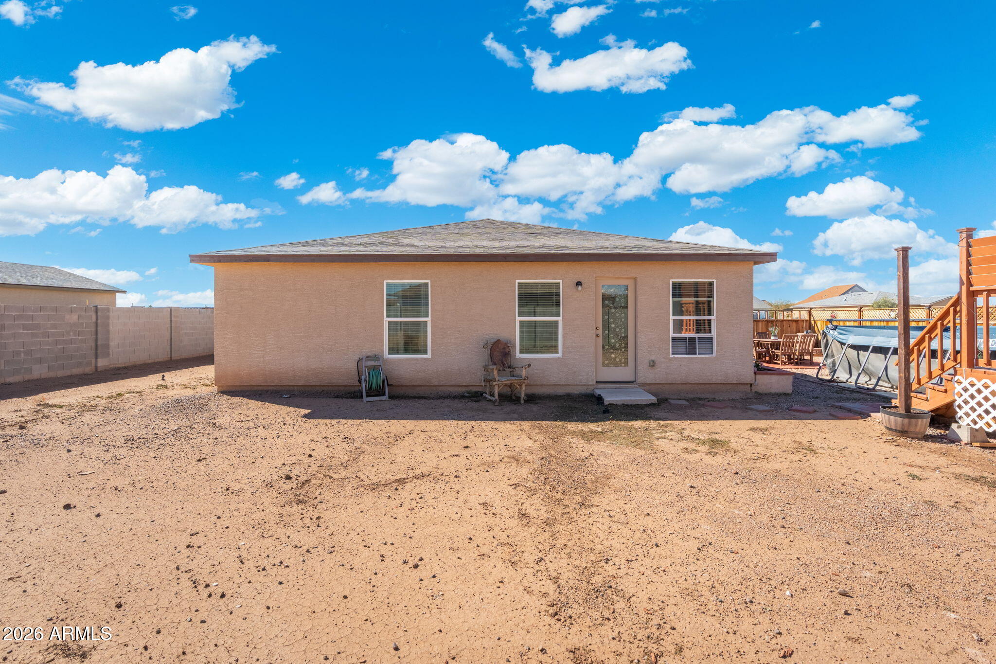 14423 South Capistrano Road Arizona City, AZ 85123 - Photo 35 of 36 a view of a house with a yard