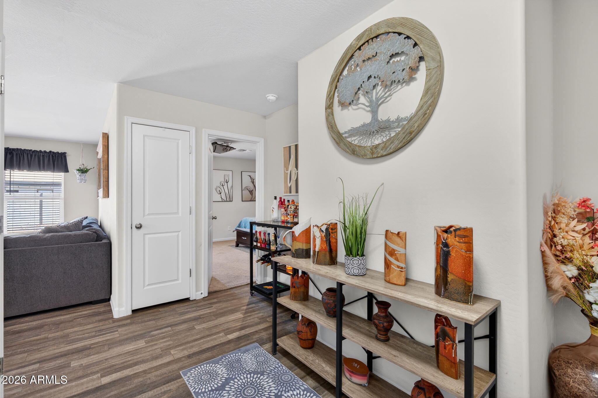 14423 South Capistrano Road Arizona City, AZ 85123 - Photo 4 of 36 a view of a workspace with furniture and a living room