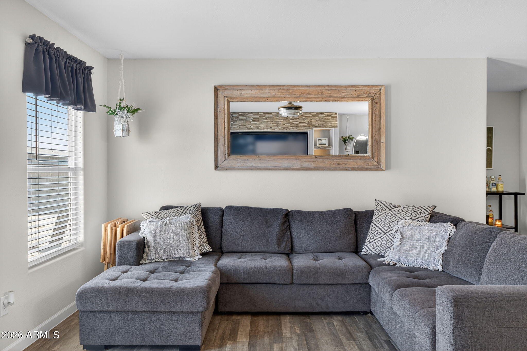 14423 South Capistrano Road Arizona City, AZ 85123 - Photo 6 of 36 a living room with furniture and a window