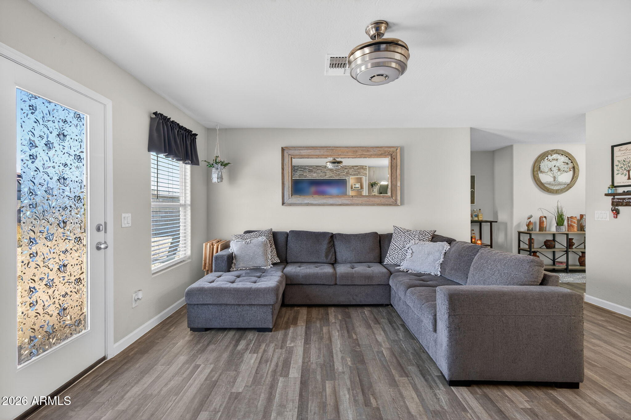 14423 South Capistrano Road Arizona City, AZ 85123 - Photo 7 of 36 a living room with furniture and a window