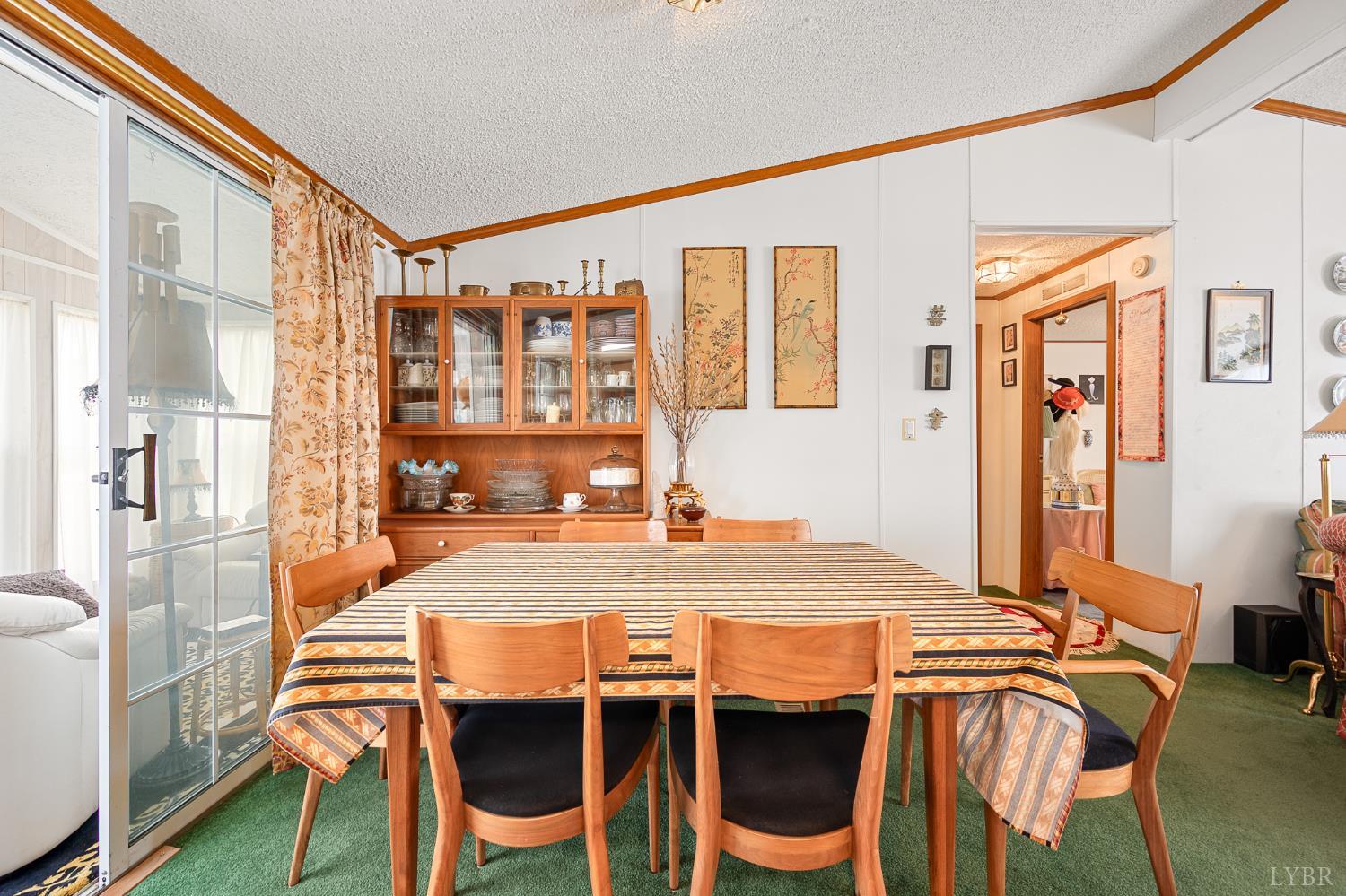 4400 Murray Hollow Road Thaxton, VA 24174 - Photo 31 of 56 a dining room with a table and chairs