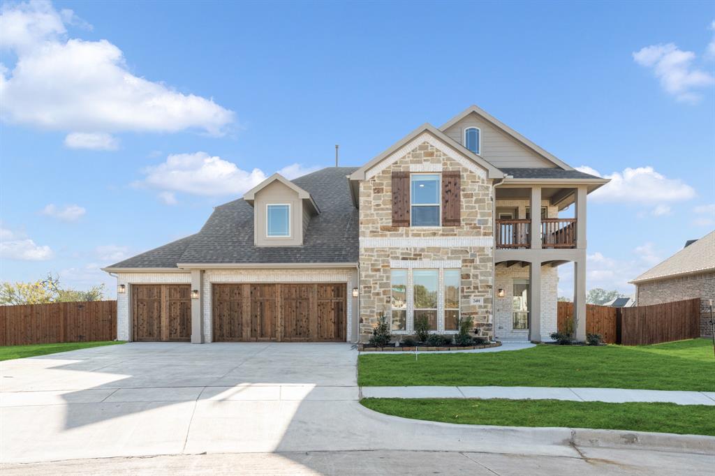 2401 Rileigh Lane Mansfield, TX 76063 - Photo 1 of 1 a front view of a house with a yard