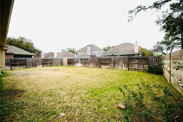 a front view of house with yard and seating area