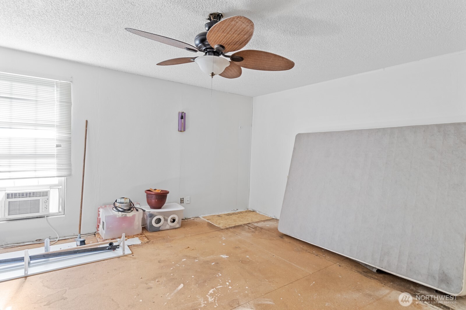 510 Duterrow Road Southeast, Unit 34 Olympia, WA 98513 - Photo 12 of 20 a room with gym equipment and a window