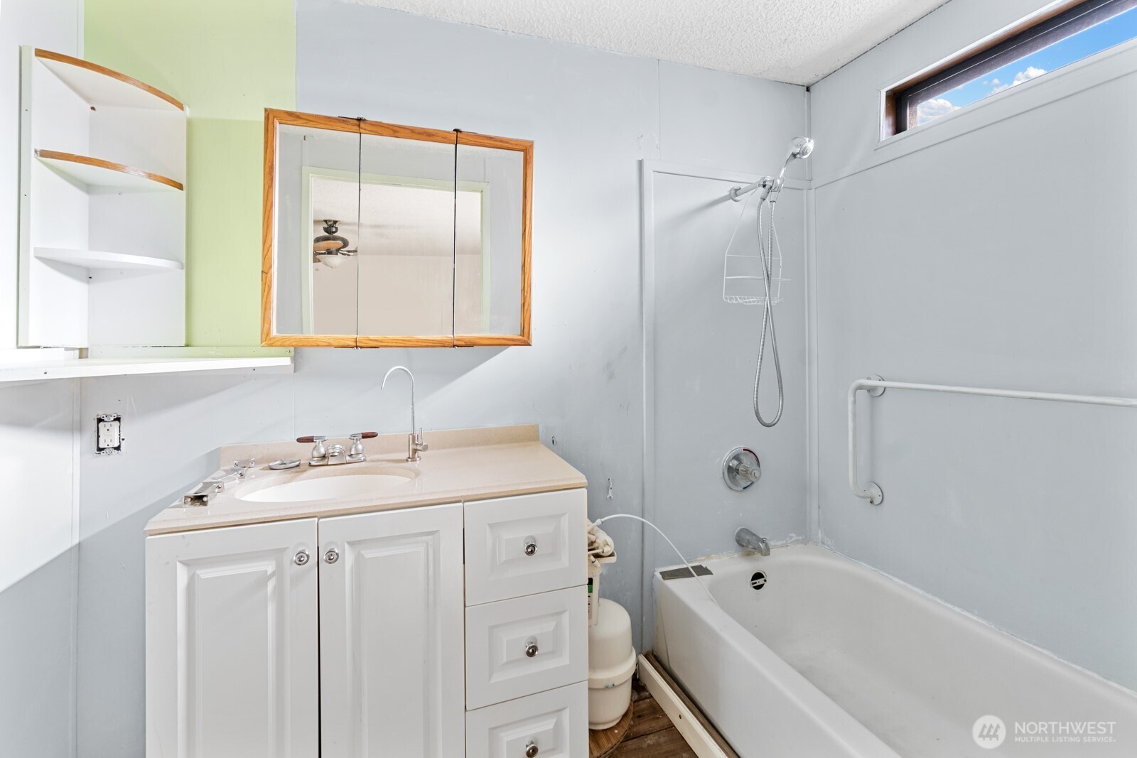 510 Duterrow Road Southeast, Unit 34 Olympia, WA 98513 - Photo 13 of 20 a bathroom with a tub sink and mirror