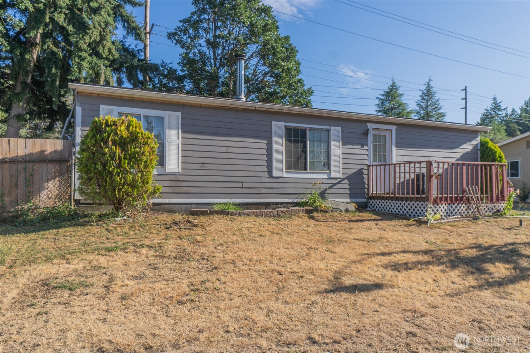 510 Duterrow Road Southeast, Unit 34 Olympia, WA 98513 - Photo 18 of 20 a house with a outdoor space