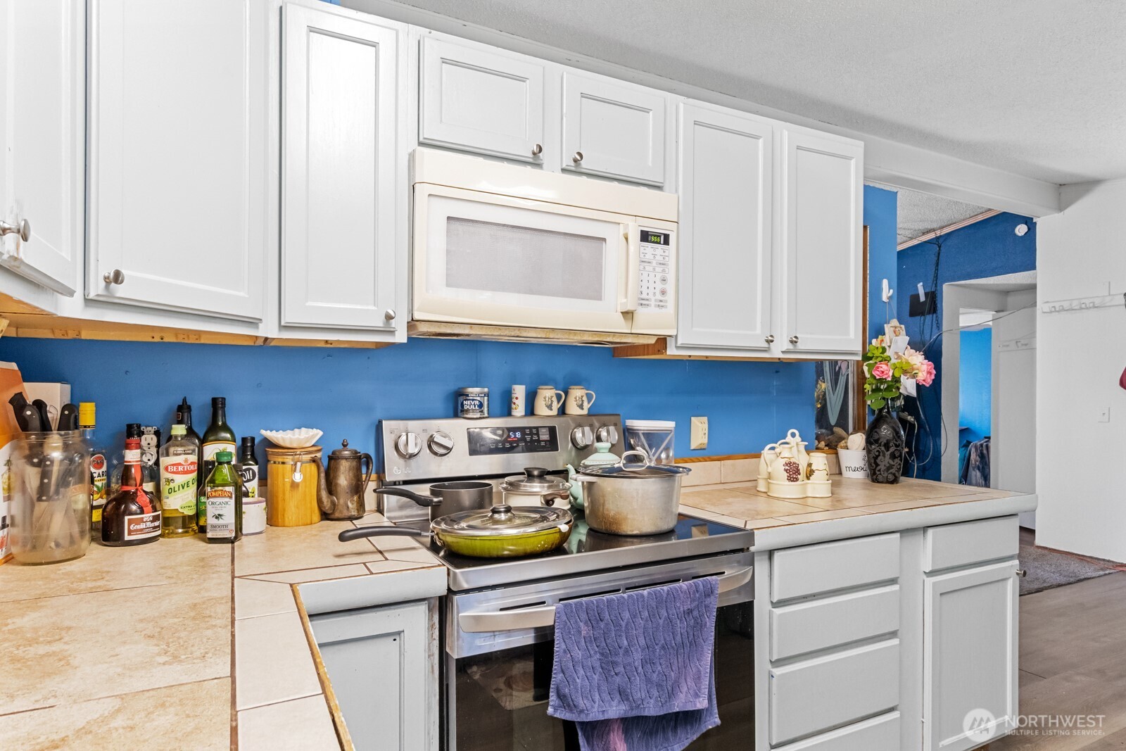 510 Duterrow Road Southeast, Unit 34 Olympia, WA 98513 - Photo 6 of 20 a kitchen with a sink and cabinets