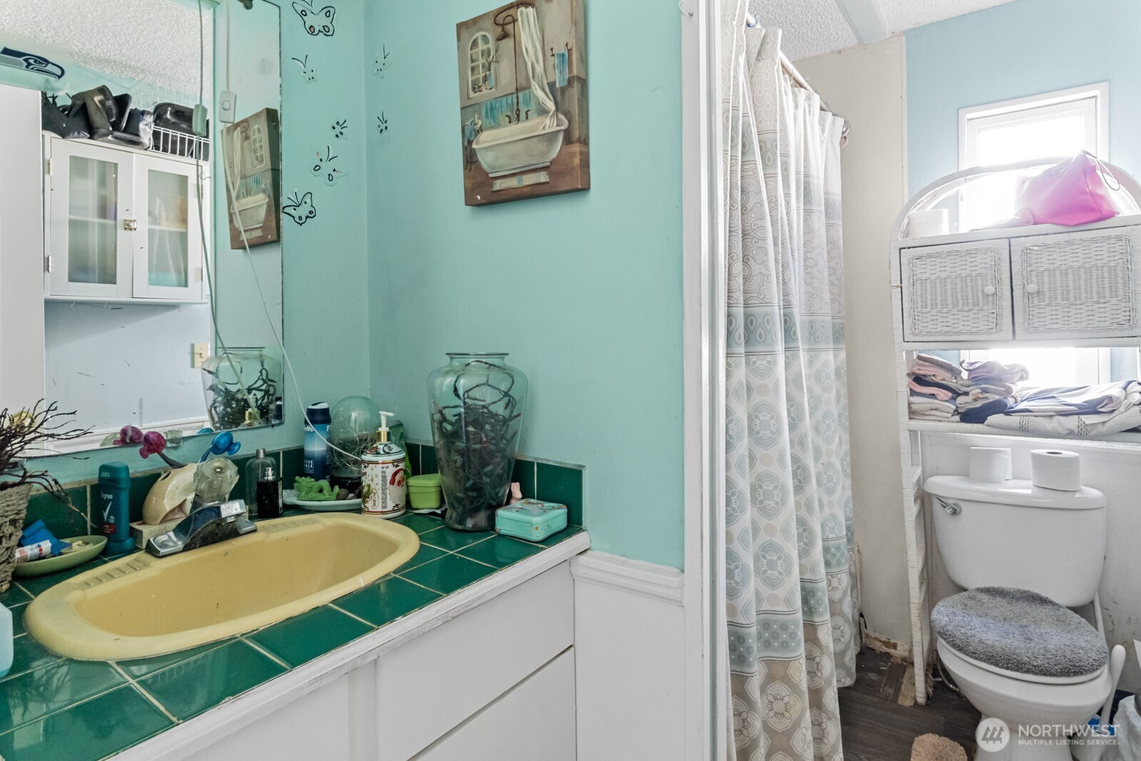 510 Duterrow Road Southeast, Unit 34 Olympia, WA 98513 - Photo 10 of 20 a bathroom with a granite countertop sink and a mirror