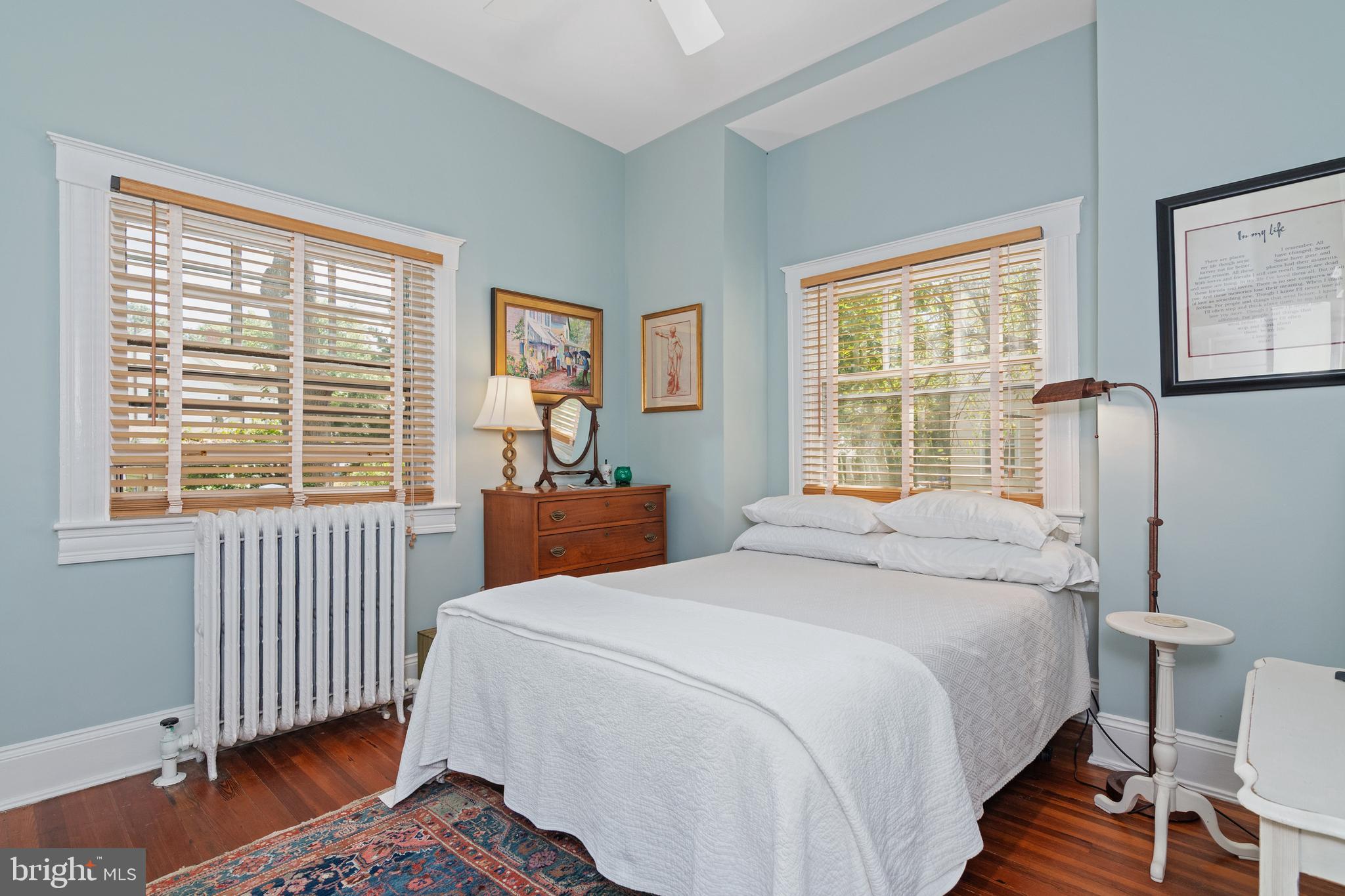 306 Oakley Street Cambridge, MD 21613 - Photo 23 of 35 a bedroom with a bed and a window