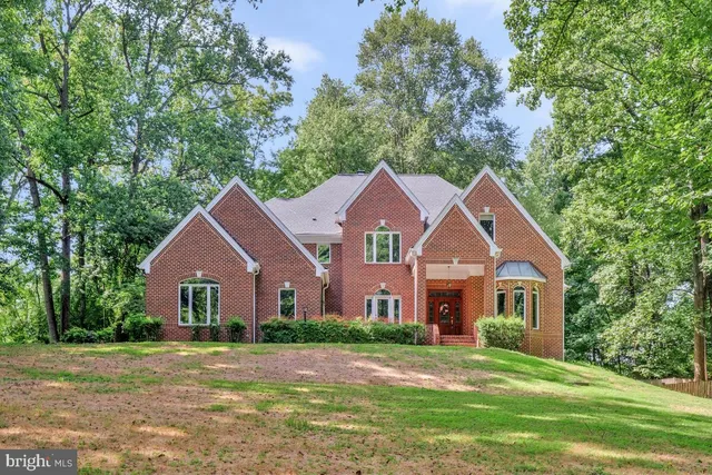 a front view of a house with yard