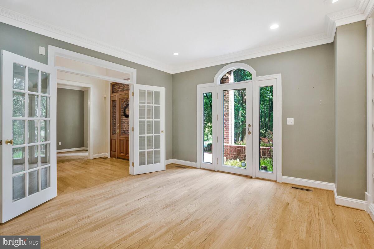 502 Seneca Knoll Court Great Falls, VA 22066 - Photo 12 of 56 a view of an entryway with wooden floor